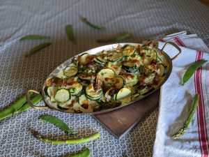 Gratin aux légumes de printemps : petits pois, courgettes et asperges Gratin aux légumes de printemps : petits pois, courgettes et asperges